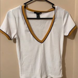 White v neck crop top with yellow and blue sleeves